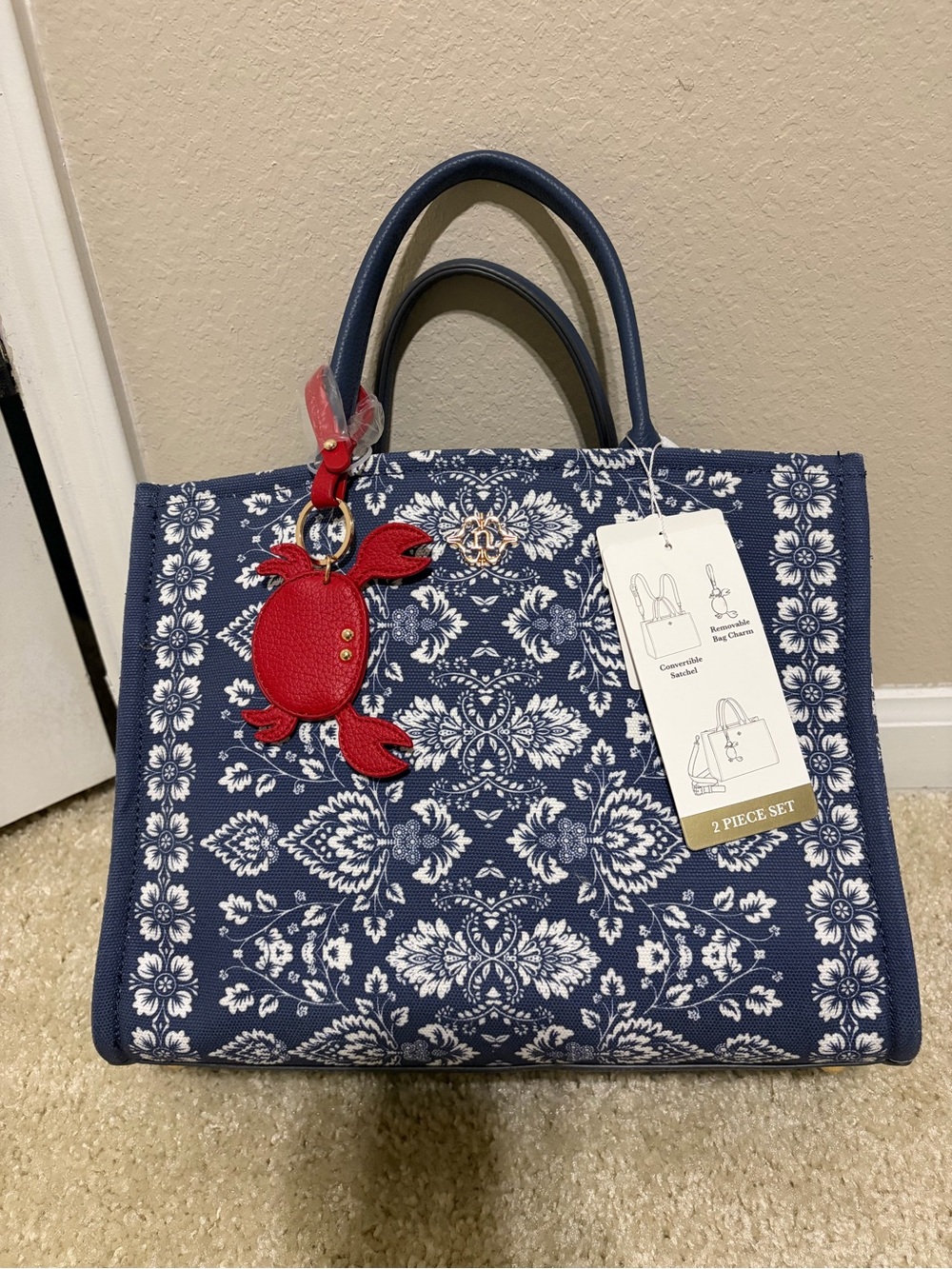 Nanette Lepore Navy and White Floral Satchel with Red Crab Charm